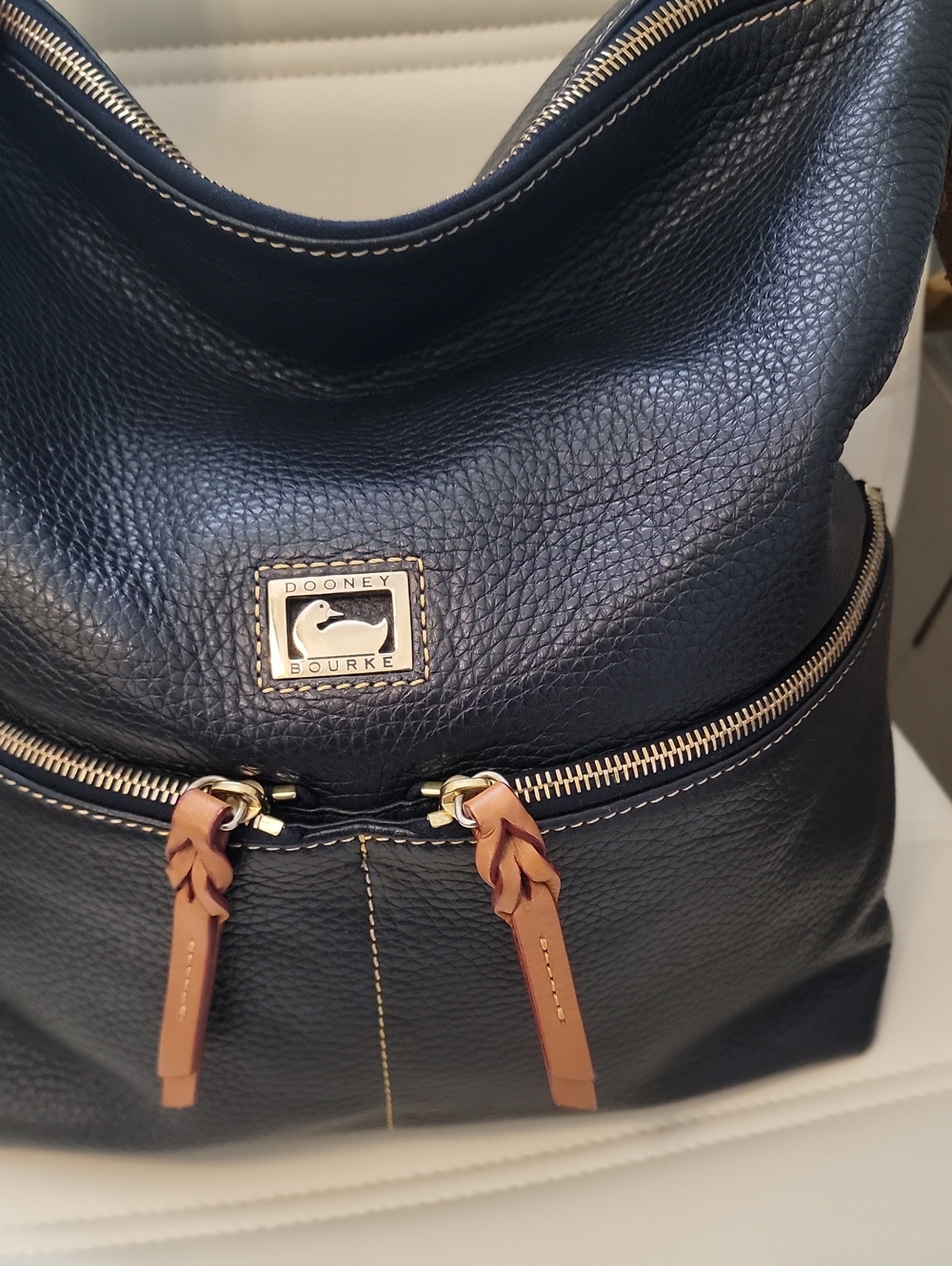 Dooney & Bourke Navy Leather Hobo with Tan Accent Pulls